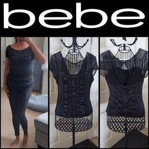 Bebe black blouse with sheer, women size large